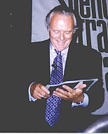 Sir Tony laughing